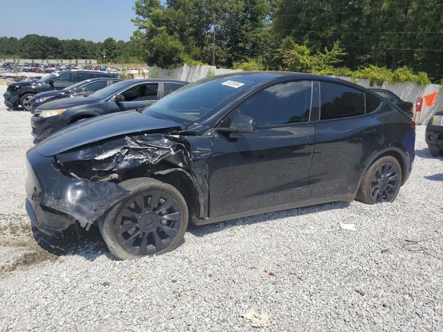 TESLA MODEL Y 2022 with VIN 7SAYGAEE3NF535554 - Photo from auction