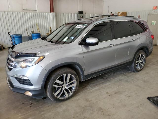 Photo 1 from auction – 2017 HONDA PILOT TOUR with VIN 5FNYF6H97HB012893