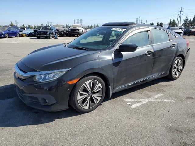 HONDA CIVIC EXL 2017 with VIN 2HGFC1F78HH650148 - Photo from auction