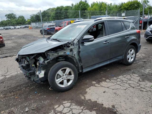 TOYOTA RAV4 XLE 2014 with VIN JTMRFREV0ED069897 - Photo from auction