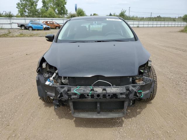 Foto 5 de la subasta – 2014 FORD FOCUS SE con VIN 1FADP3K25EL105545