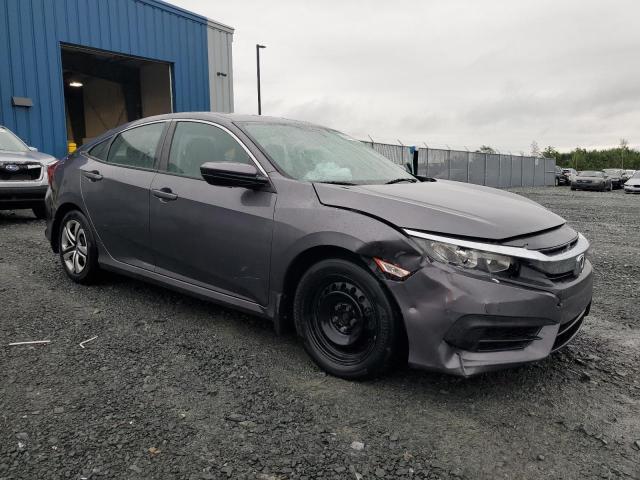 Photo 4 from auction – 2017 HONDA CIVIC LX with VIN 2HGFC2E53HH034184
