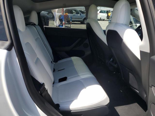 Photo 10 from auction – 2022 TESLA MODEL Y with VIN 7SAYGAEE8NF559042