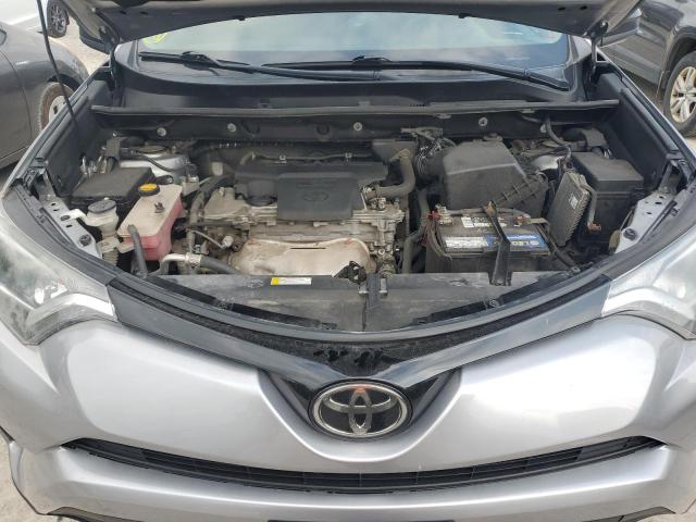 Photo 12 from auction – 2018 TOYOTA RAV4 LE with VIN 2T3BFREV2JW763232