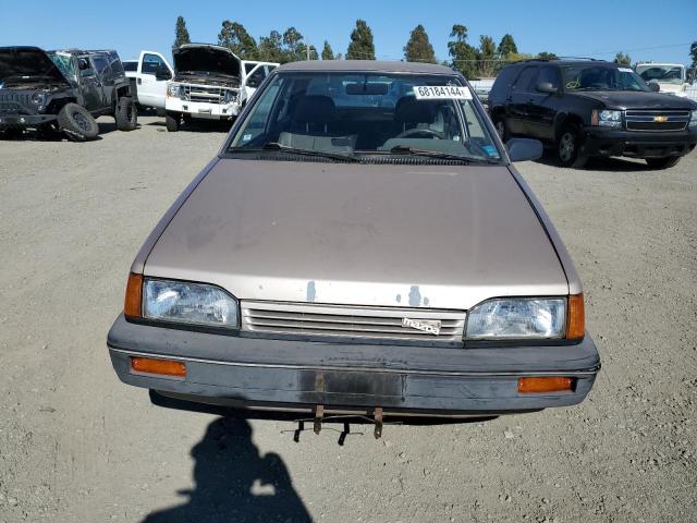 Photo 5 from auction – 1989 MAZDA 323 with VIN JM1BF2329K0392124