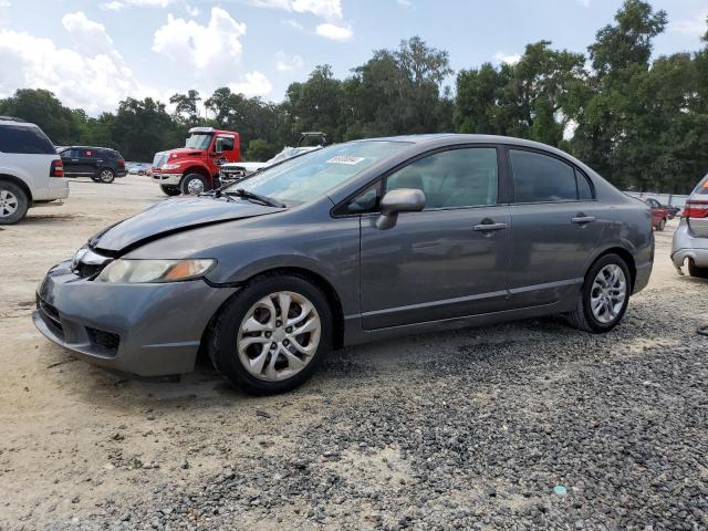HONDA CIVIC LX 2011 with VIN 2HGFA1F56BH306104 - Photo from auction