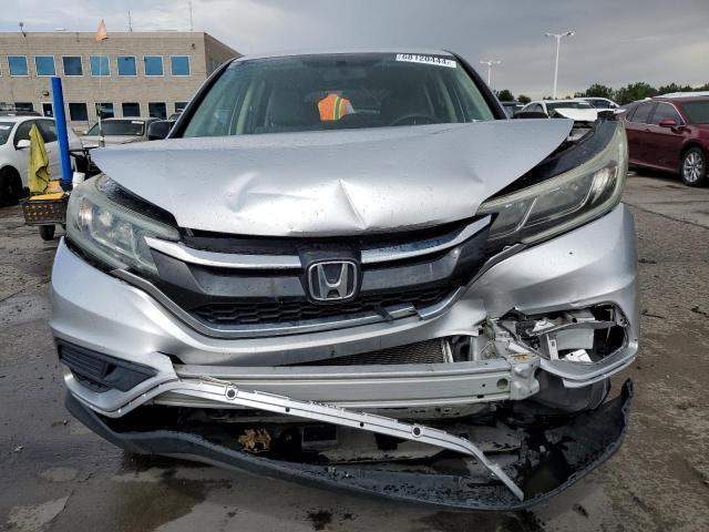Photo 5 from auction – 2015 HONDA CR-V LX with VIN 5J6RM4H34FL068529