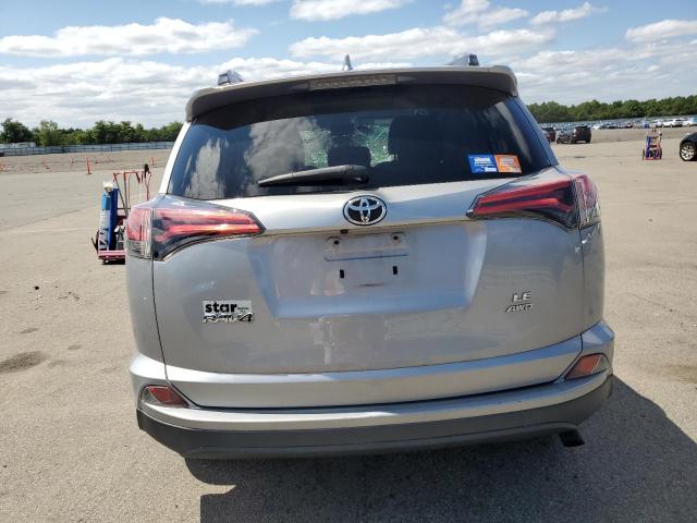 Photo 6 from auction – 2018 TOYOTA RAV4 LE with VIN 2T3BFREV8JW752512