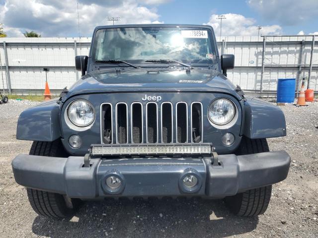 Photo 5 from auction – 2016 JEEP WRANGLER U with VIN 1C4BJWEG0GL231729
