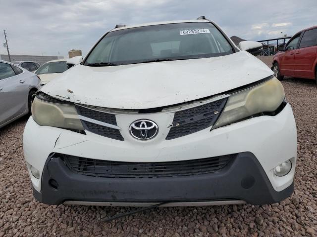 Photo 5 from auction – 2014 TOYOTA RAV4 XLE with VIN JTMWFREVXEJ015768