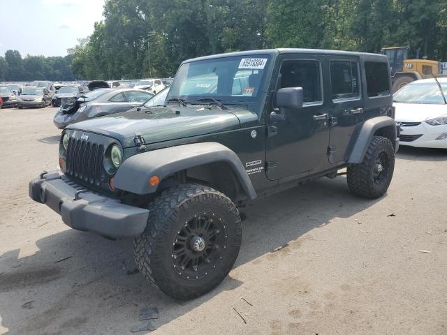 JEEP WRANGLER U 2011 with VIN 1J4BA3H11BL609288 - Photo from auction