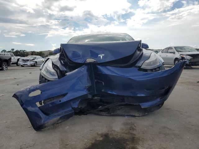 Photo 5 from auction – 2022 TESLA MODEL 3 with VIN 5YJ3E1EA1NF192088