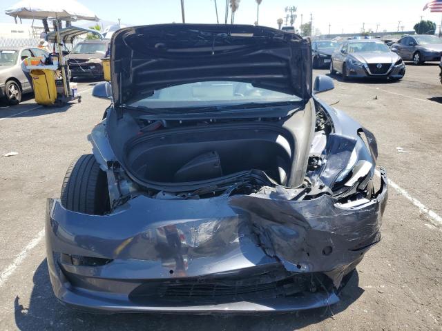 Photo 5 from auction – 2022 TESLA MODEL 3 with VIN 5YJ3E1EB2NF132703