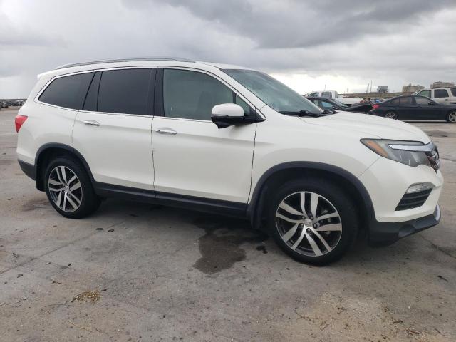 Photo 4 from auction – 2017 HONDA PILOT TOUR with VIN 5FNYF5H9XHB027205