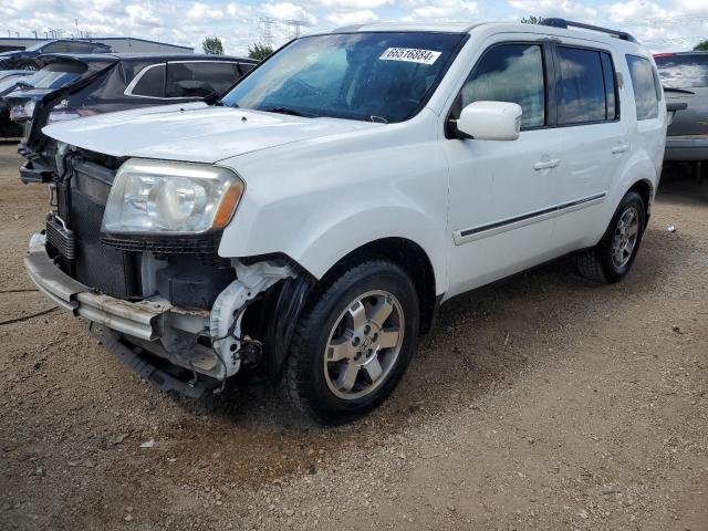 HONDA PILOT TOUR 2011 with VIN 5FNYF4H9XBB089513 - Photo from auction