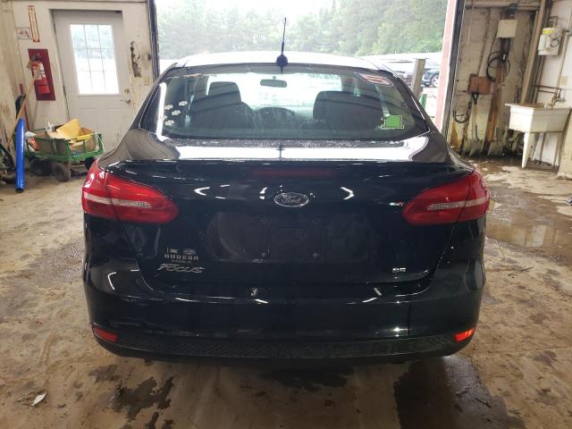 Foto 6 de la subasta – 2018 FORD FOCUS SE con VIN 1FADP3F25JL236401