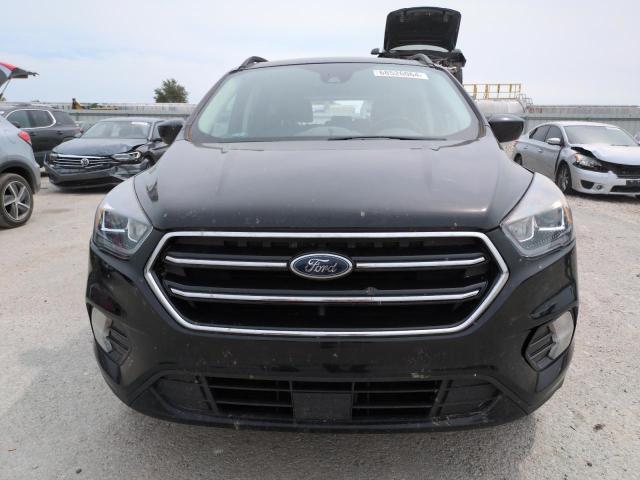 Photo 5 from auction – 2018 FORD ESCAPE SE with VIN 1FMCU0GD7JUC70052