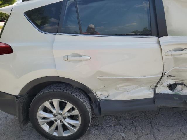 Photo 11 from auction – 2014 TOYOTA RAV4 with VIN JTMYFREV3ED037148