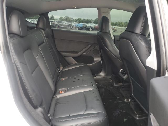 Photo 10 from auction – 2023 TESLA MODEL Y with VIN 7SAYGDEE0PA079529