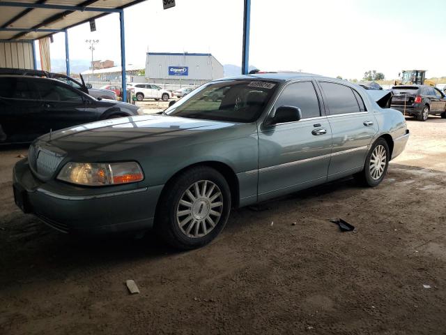 Photo 1 from auction – 2004 LINCOLN TOWN CAR E with VIN 1LNHM81W64Y620038