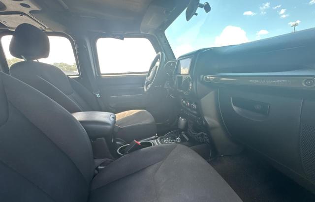 Photo 5 from auction – 2015 JEEP WRANGLER U with VIN 1C4BJWDG2FL773933