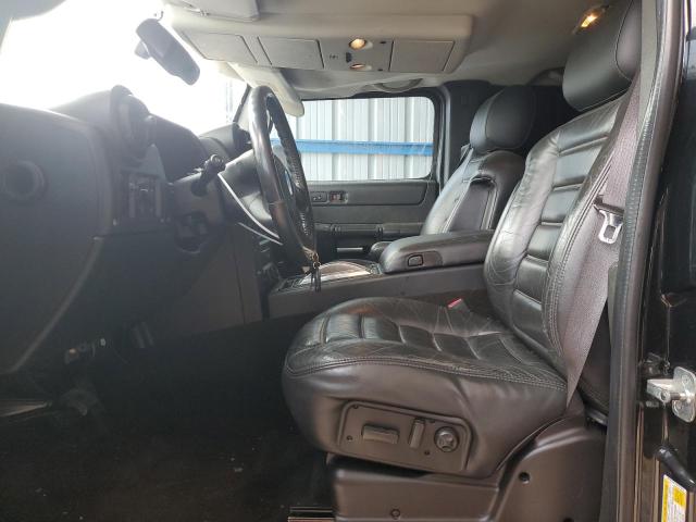 Photo 7 from auction – 2006 HUMMER H2 with VIN 5GRGN23U16H105309