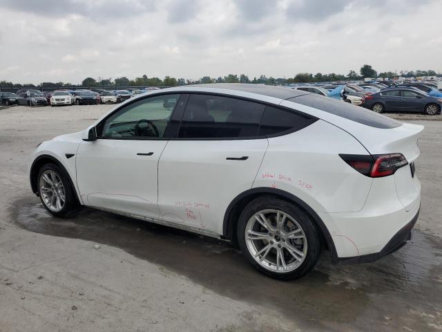 Photo 2 from auction – 2021 TESLA MODEL Y with VIN 5YJYGDEE7MF073285