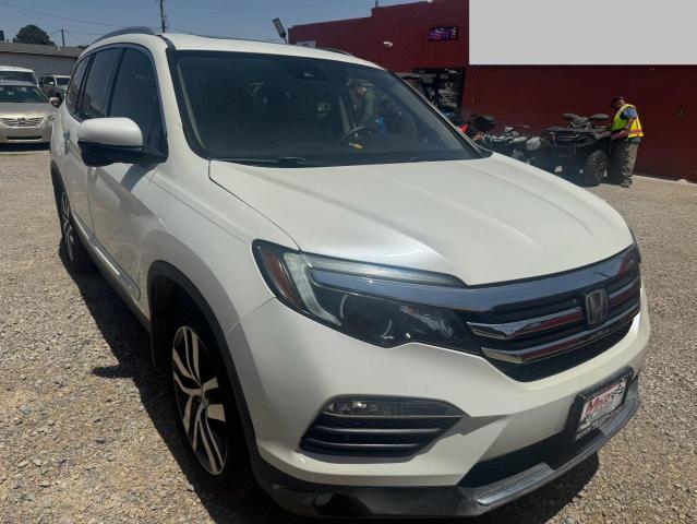 Photo 1 from auction – 2017 HONDA PILOT TOUR with VIN 5FNYF5H94HB025126
