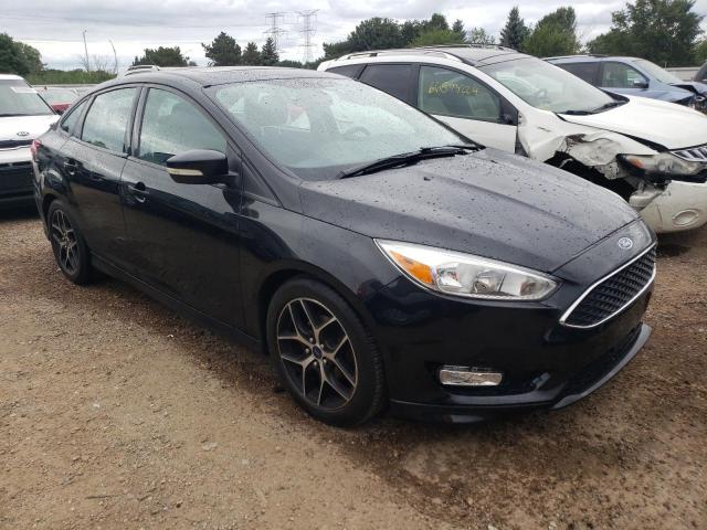 Photo 4 from auction – 2015 FORD FOCUS SE with VIN 1FADP3F24FL382604