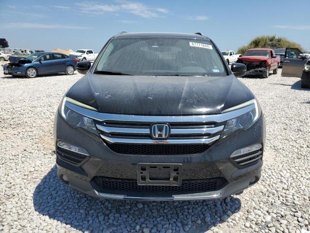 Photo 5 from auction – 2017 HONDA PILOT ELIT with VIN 5FNYF6H03HB105346