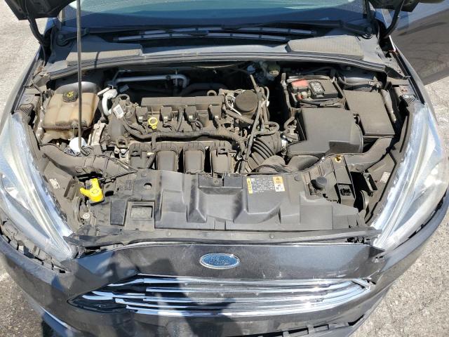 Photo 11 from auction – 2015 FORD FOCUS TITA with VIN 1FADP3N24FL387075