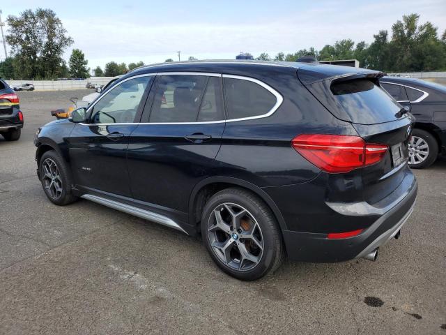 Photo 2 from auction – 2016 BMW X1 XDRIVE2 with VIN WBXHT3C34G5E54675
