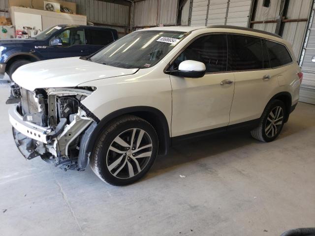HONDA PILOT ELIT 2016 with VIN 5FNYF6H05GB042653 - Photo from auction