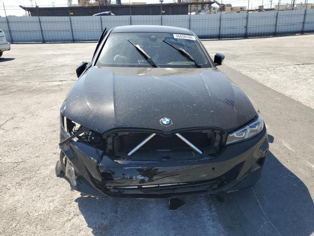 Photo 5 from auction – 2023 BMW 330I with VIN 3MW69FF07P8D52077