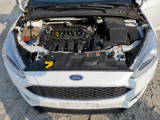 Photo 11 from auction – 2018 FORD FOCUS SE with VIN 1FADP3F22JL318280