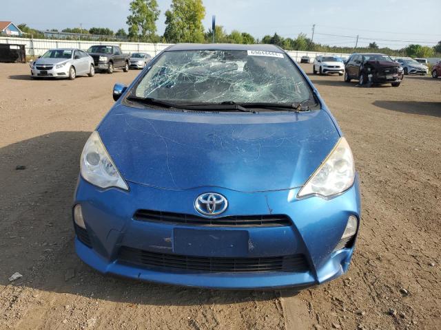 Photo 5 from auction – 2014 TOYOTA PRIUS C with VIN JTDKDTB3XE1570336