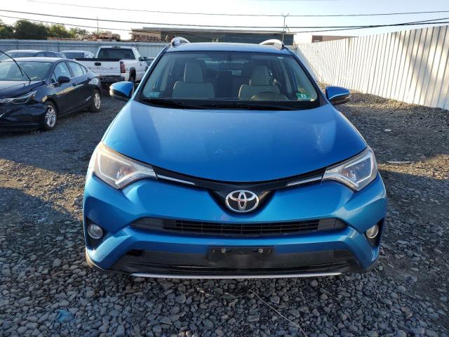 Photo 5 from auction – 2016 TOYOTA RAV4 XLE with VIN JTMRFREV8GJ098844