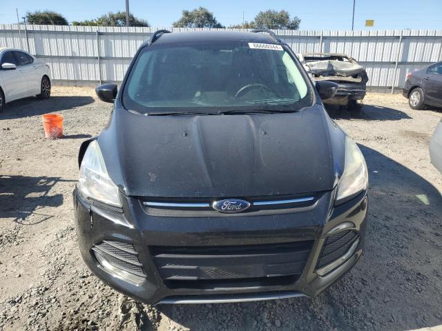 Photo 5 from auction – 2015 FORD ESCAPE SE with VIN 1FMCU9G92FUB74286