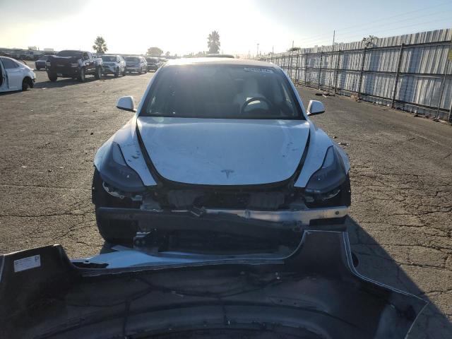 Photo 5 from auction – 2021 TESLA MODEL 3 with VIN 5YJ3E1EC9MF875334