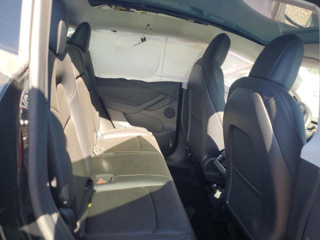 Photo 10 from auction – 2022 TESLA MODEL Y with VIN 7SAYGDEE2NF332379
