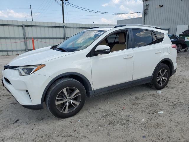 TOYOTA RAV4 XLE 2017 with VIN JTMRFREV4HJ173038 - Photo from auction