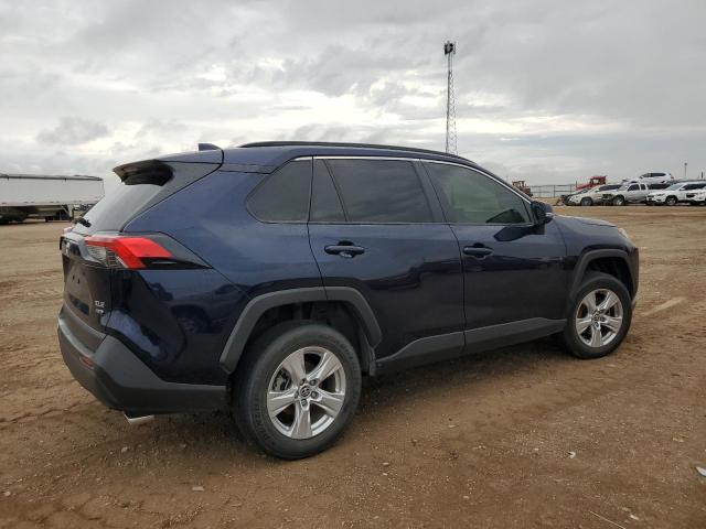 Photo 3 from auction – 2021 TOYOTA RAV4 XLE with VIN JTMP1RFV0MD076965