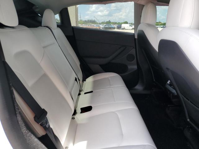 Photo 11 from auction – 2023 TESLA MODEL Y with VIN 7SAYGDEE1PF590900