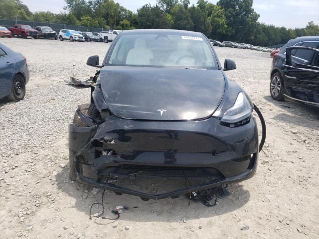 Photo 5 from auction – 2023 TESLA MODEL Y with VIN 7SAYGAEE7PF847718