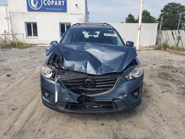 Photo 5 from auction – 2016 MAZDA CX-5 GT with VIN JM3KE4DYXG0752971