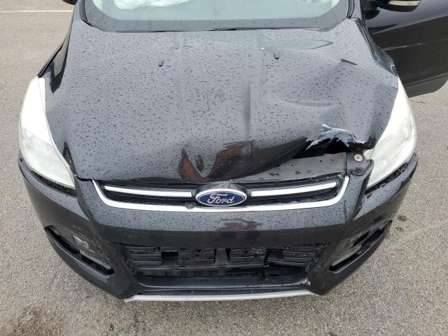 Photo 12 from auction – 2014 FORD ESCAPE TIT with VIN 1FMCU0J97EUE57656