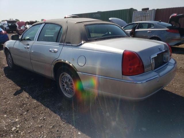 Photo 2 from auction – 2004 LINCOLN TOWN CAR E with VIN 1LNHM81W54Y626929