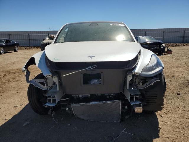 Photo 5 from auction – 2022 TESLA MODEL Y with VIN 7SAYGDEE0NF340478