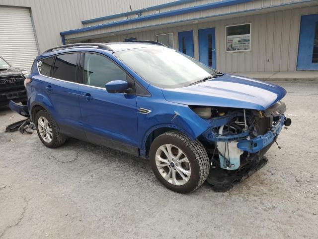 Photo 4 from auction – 2018 FORD ESCAPE SE with VIN 1FMCU0GD8JUA52010