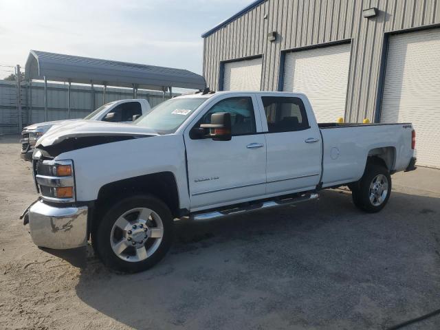 CHEVROLET SILVERADO 2019 with VIN 1GC1KREG9KF179535 - Photo from auction
